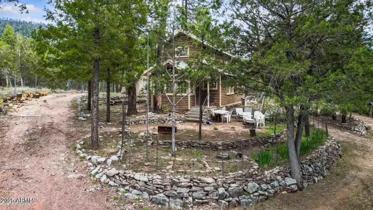 259 South Morris Meadows Payson, AZ 85541 - Photo 30 of 33 a view of outdoor space with lots of trees