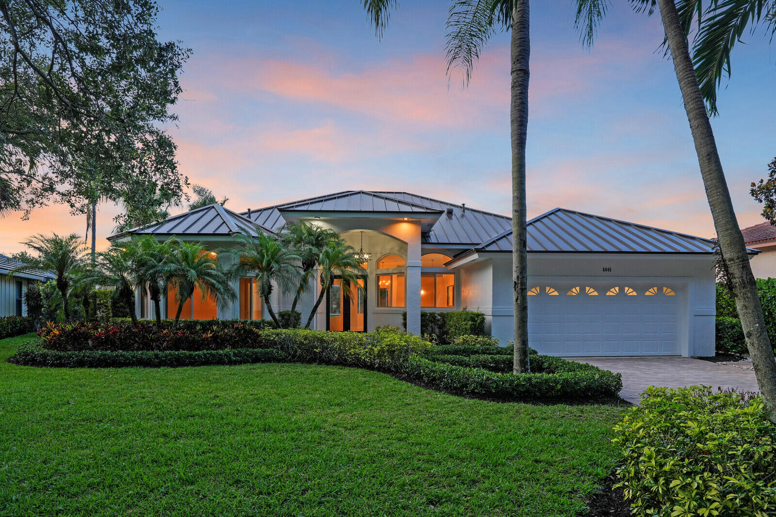 6845 Big Cypress Drive Jupiter, FL 33458 - Photo 48 of 66 59_Twilight_1_mls