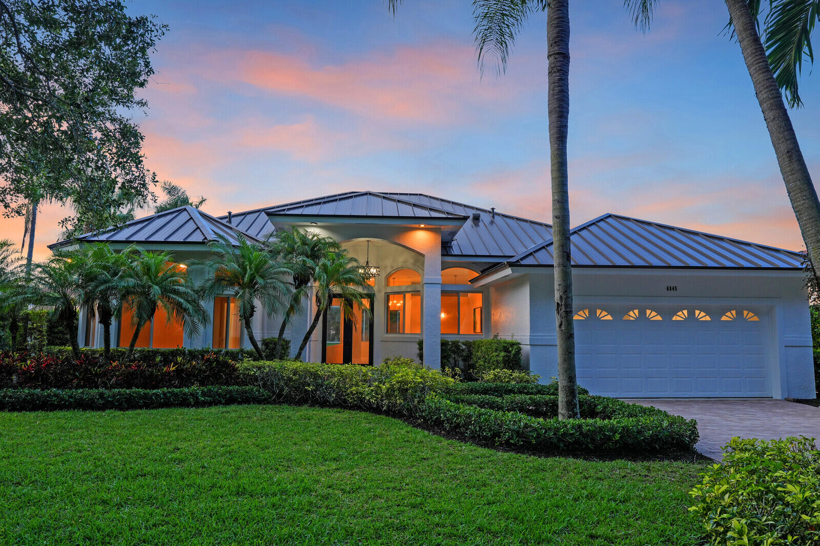 6845 Big Cypress Drive Jupiter, FL 33458 - Photo 49 of 66 60_Twilight_2_mls