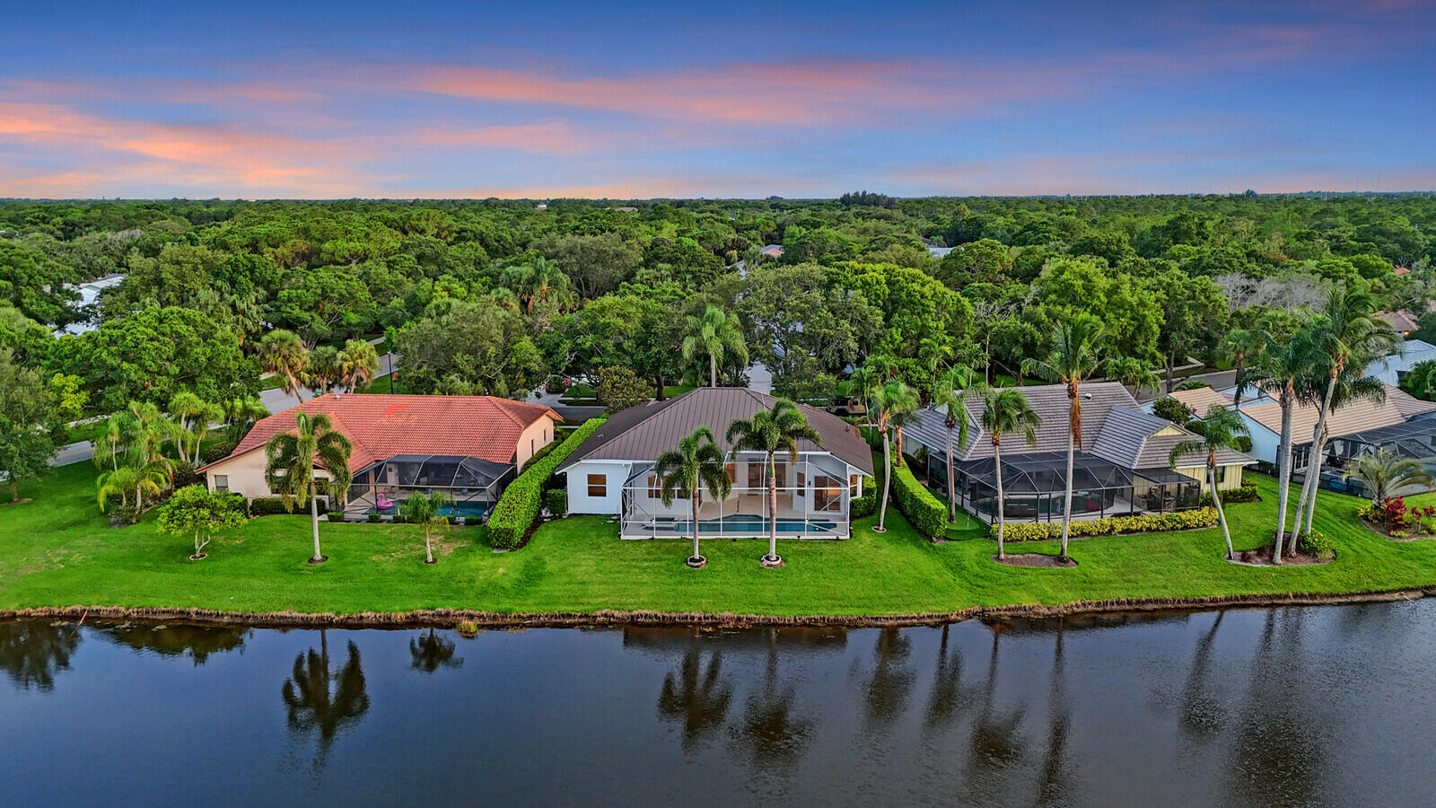 6845 Big Cypress Drive Jupiter, FL 33458 - Photo 60 of 66 77_Twilight_Aerial_5_mls