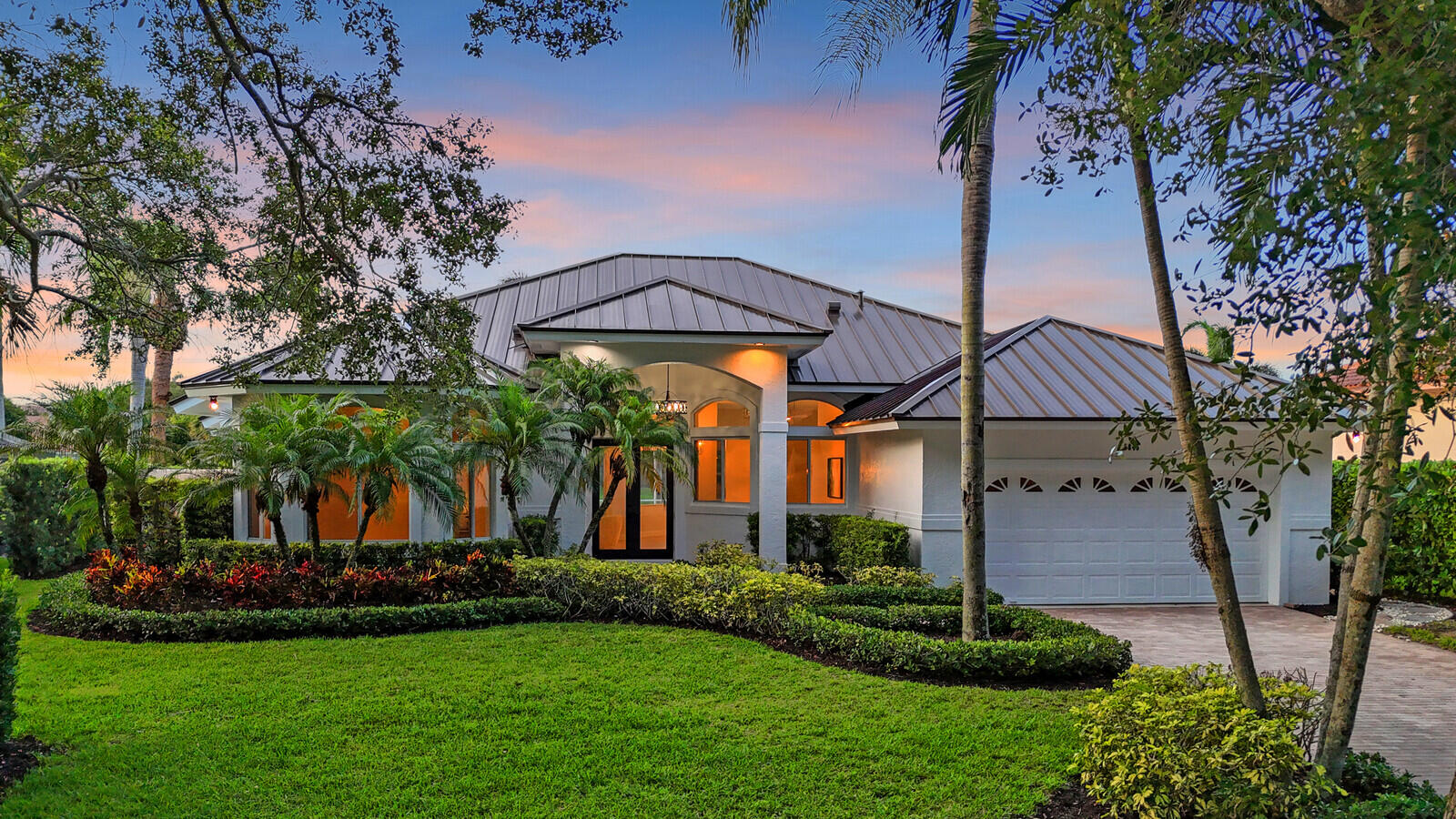 6845 Big Cypress Drive Jupiter, FL 33458 - Photo 64 of 66 74_Twilight_Aerial_2_mls