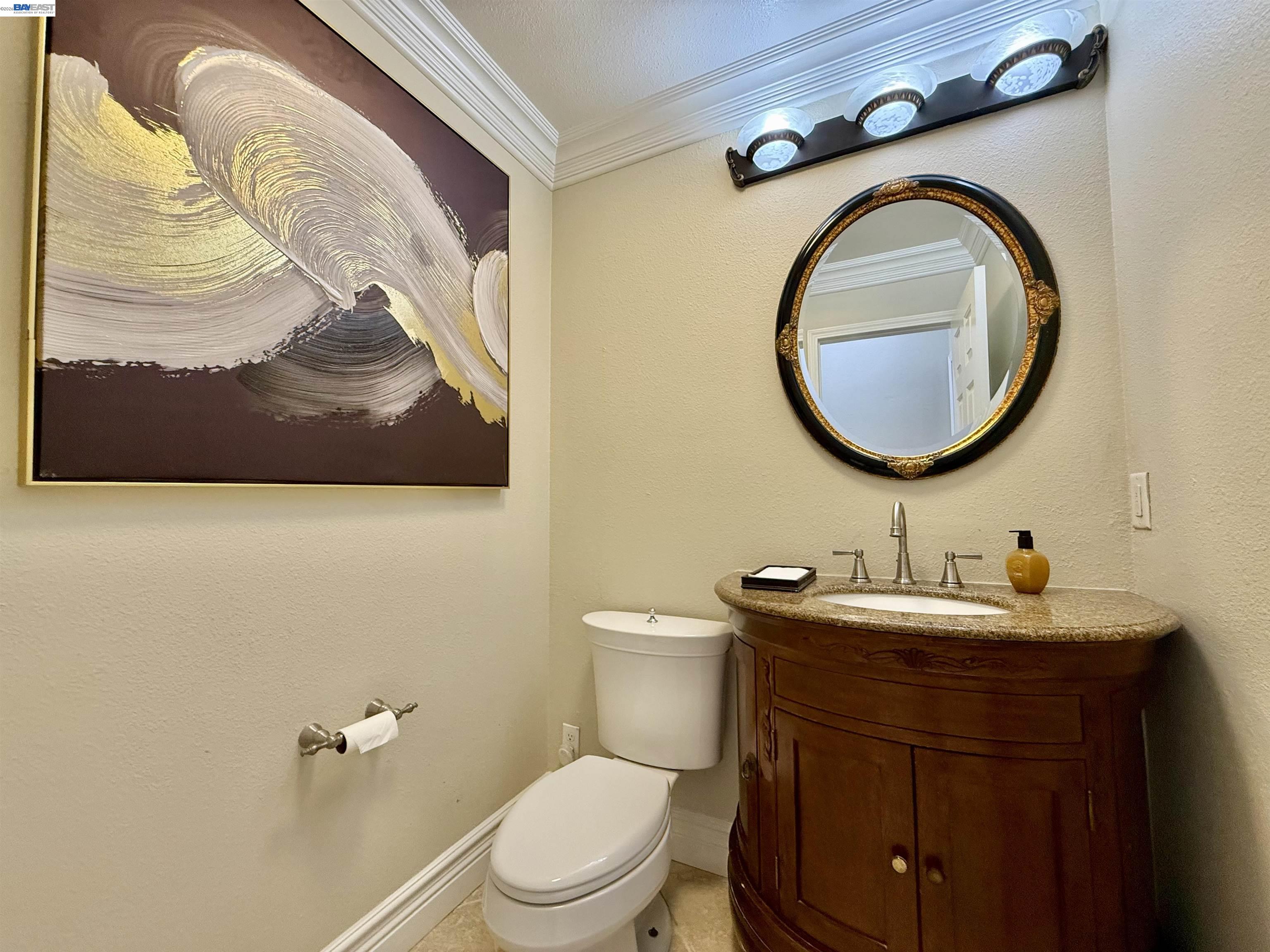 1284 Riesling Circle Livermore, CA 94550 - Photo 32 of 79 a bathroom with a toilet a sink and mirror
