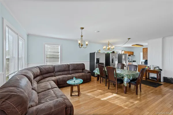 a view of a livingroom with furniture and window