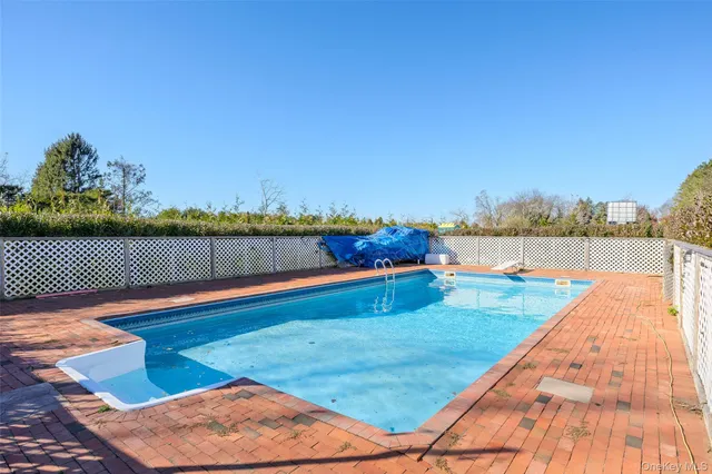 a view of lake and houses with outdoor space