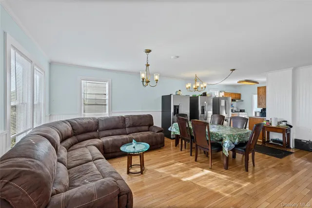 a view of a livingroom with furniture and window
