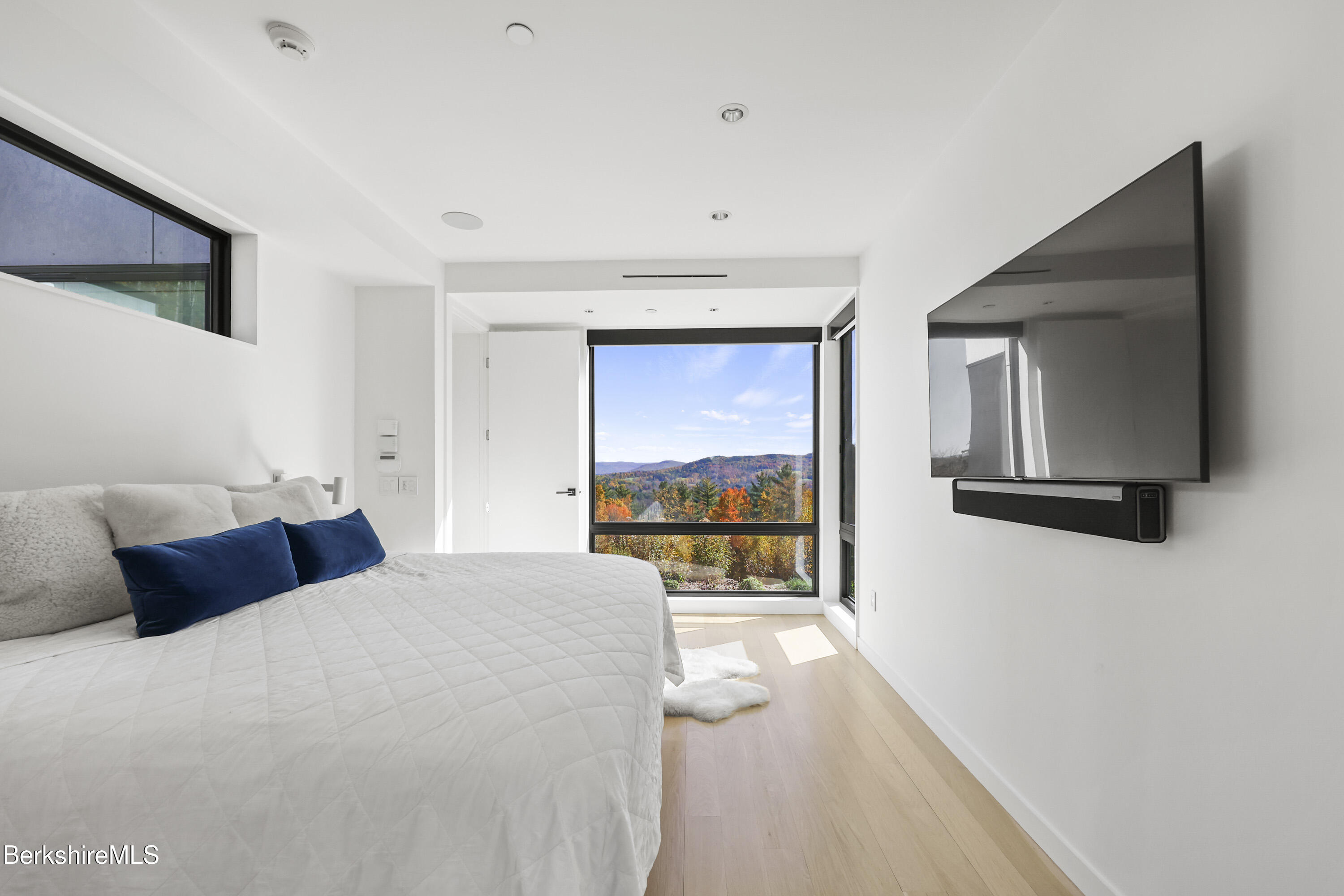 42 West Alford Road West Stockbridge, MA 01266 - Photo 15 of 35 a bedroom with a bed and large window