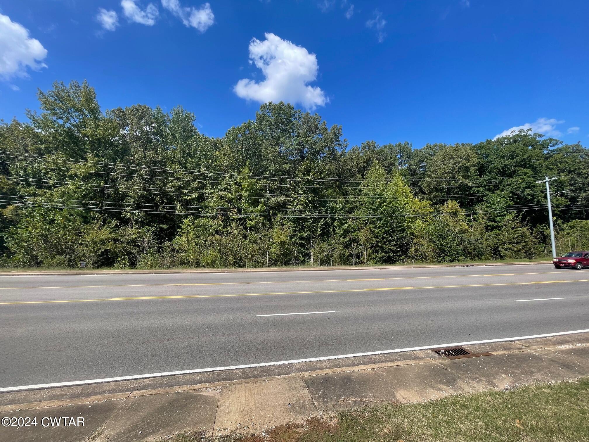 0 Campbell Street Jackson, TN 38305 - Photo 6 of 6 a view of a yard and basketball court