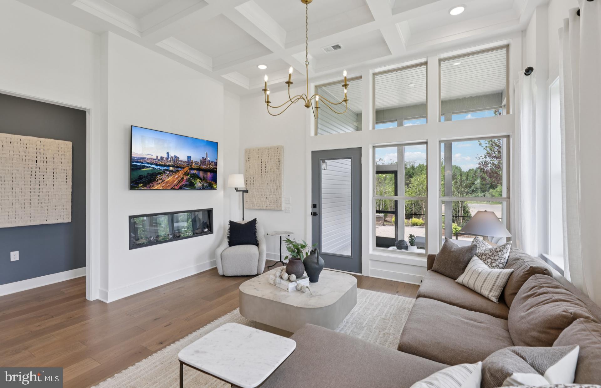 6152 Amber Lane, Unit 2 Haymarket, VA 20169 - Photo 1 of 57 a living room with furniture a fireplace and a flat screen tv