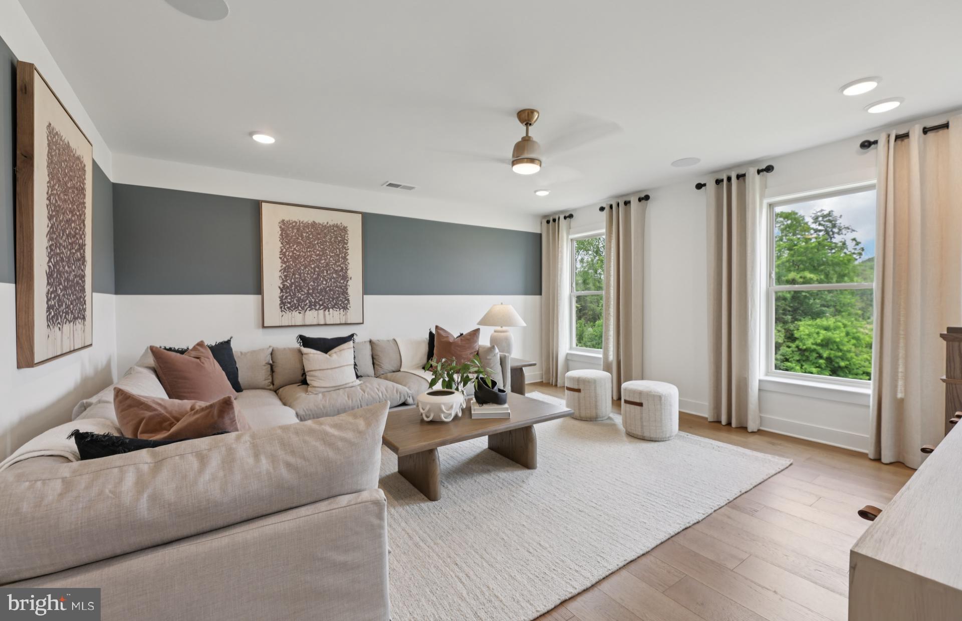 6152 Amber Lane, Unit 2 Haymarket, VA 20169 - Photo 23 of 57 a living room with furniture and a large window