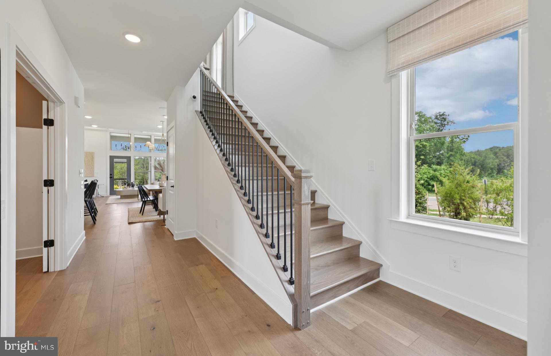 6152 Amber Lane, Unit 2 Haymarket, VA 20169 - Photo 4 of 57 a view of entryway and hall with wooden floor