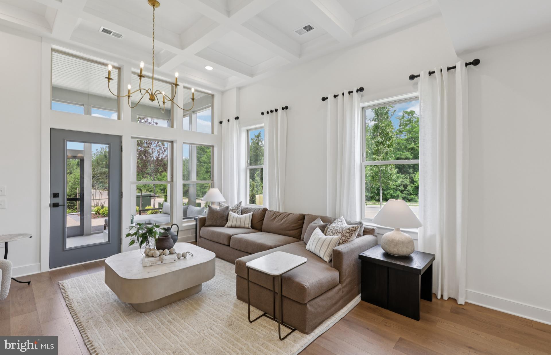 6152 Amber Lane, Unit 2 Haymarket, VA 20169 - Photo 6 of 57 a living room with furniture and a large window
