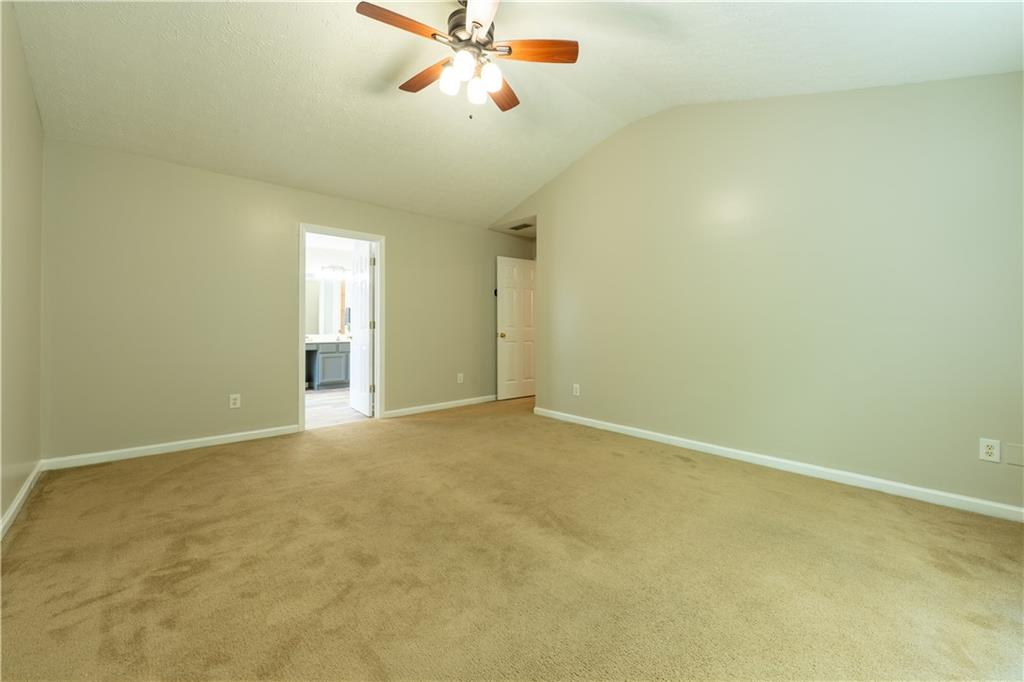 2238 St Albans Place Buford, GA 30519 - Photo 35 of 56 an empty room with windows and fan