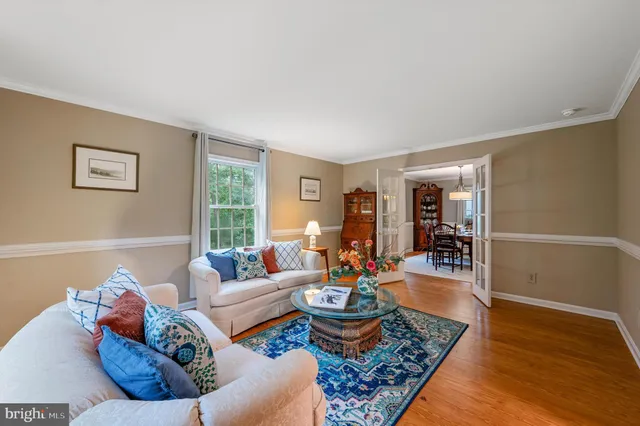 a view of a patio with a dining table and chairs