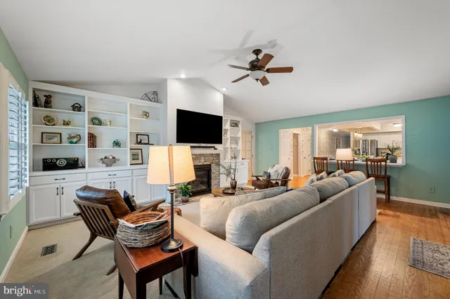 a bedroom with a bed and a lamp