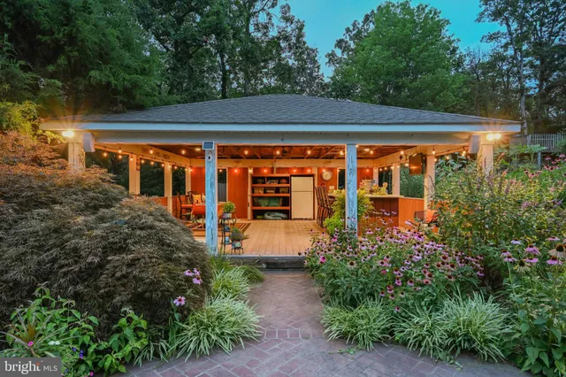 a front view of a house with yard