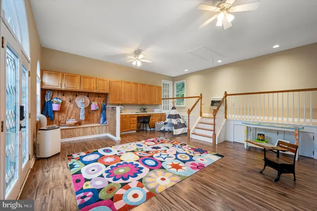a front view of a house with a yard and balcony