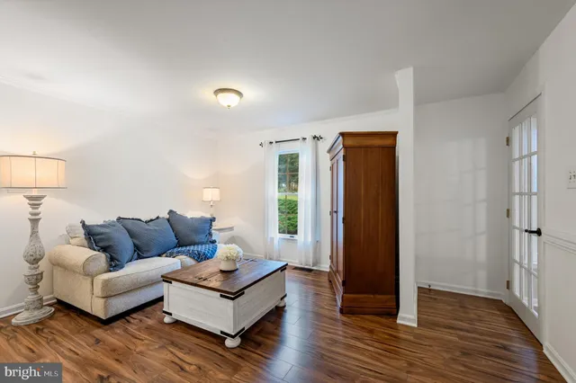 a view of a field with an ocean