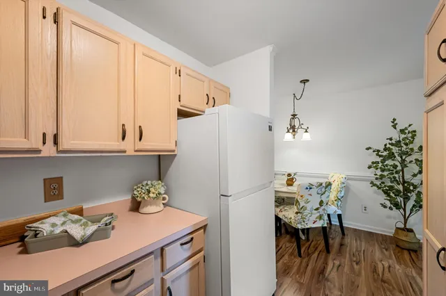 a view of a lush green hillside and a houses