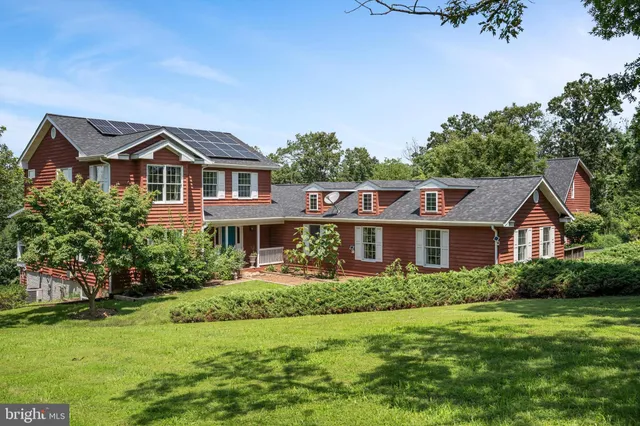 a front view of a building with garden