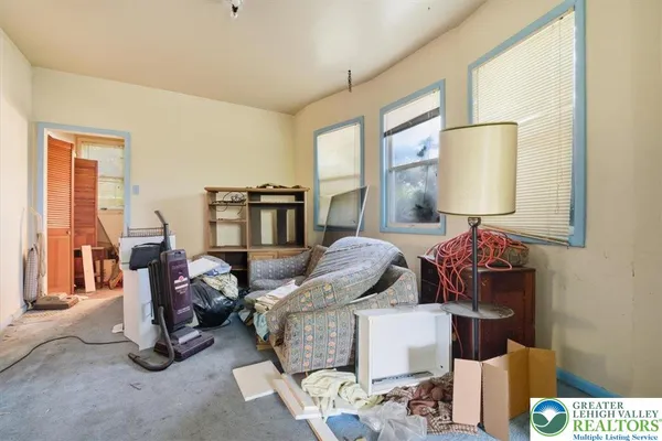 a living room with a couch and a table