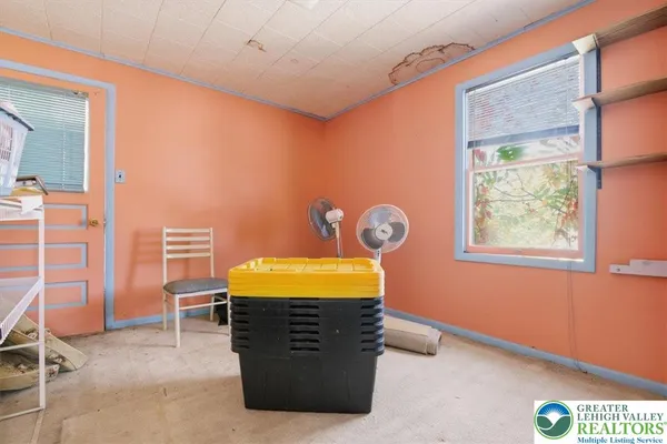 a view of a room with shelves