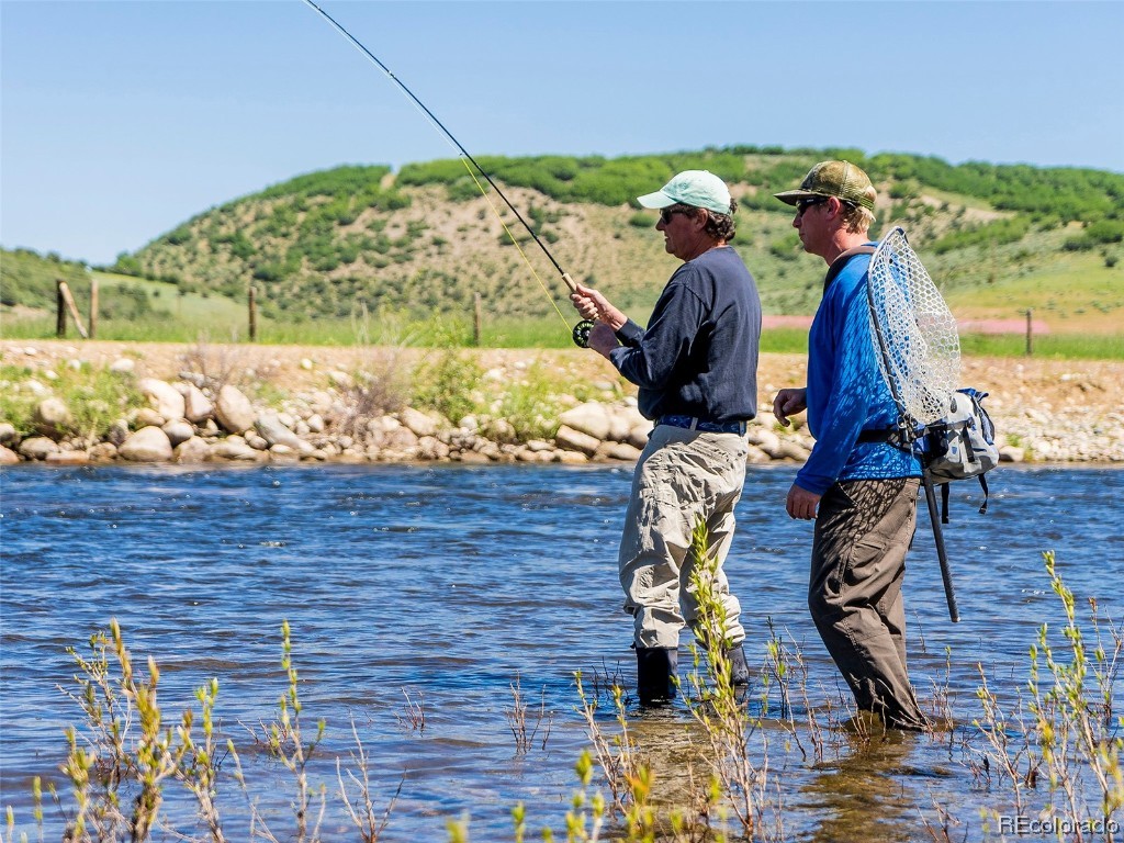 41700 Marabou Loop Steamboat Springs, CO 80487 - Photo 21 of 28 a view of a wooden house with a yard