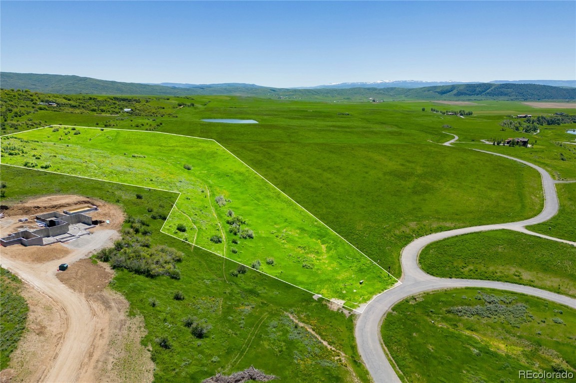 41700 Marabou Loop Steamboat Springs, CO 80487 - Photo 6 of 28 a view of a golf course with a swimming pool