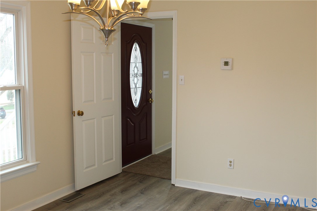 13909 Sagebrook Road Midlothian, VA 23112 - Photo 17 of 41 an entryway with wooden floor and closet