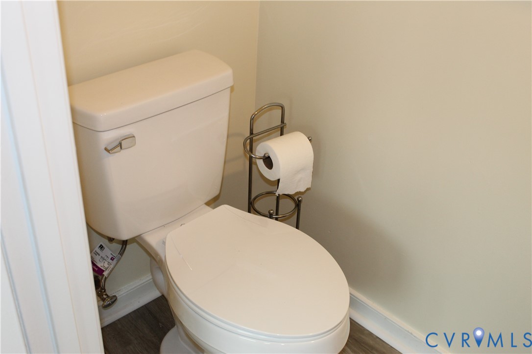 13909 Sagebrook Road Midlothian, VA 23112 - Photo 20 of 41 a bathroom with a toilet and a mirror