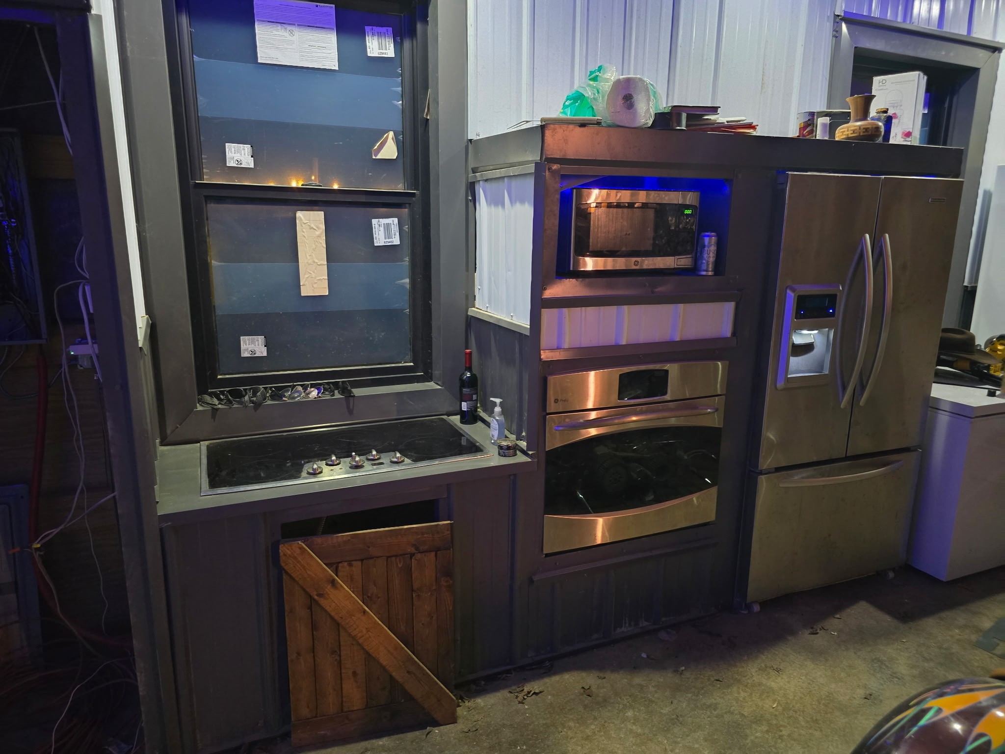 5921 Beard Road Franklin, TN 37064 - Photo 11 of 14 a kitchen with stainless steel appliances granite countertop a stove and a microwave