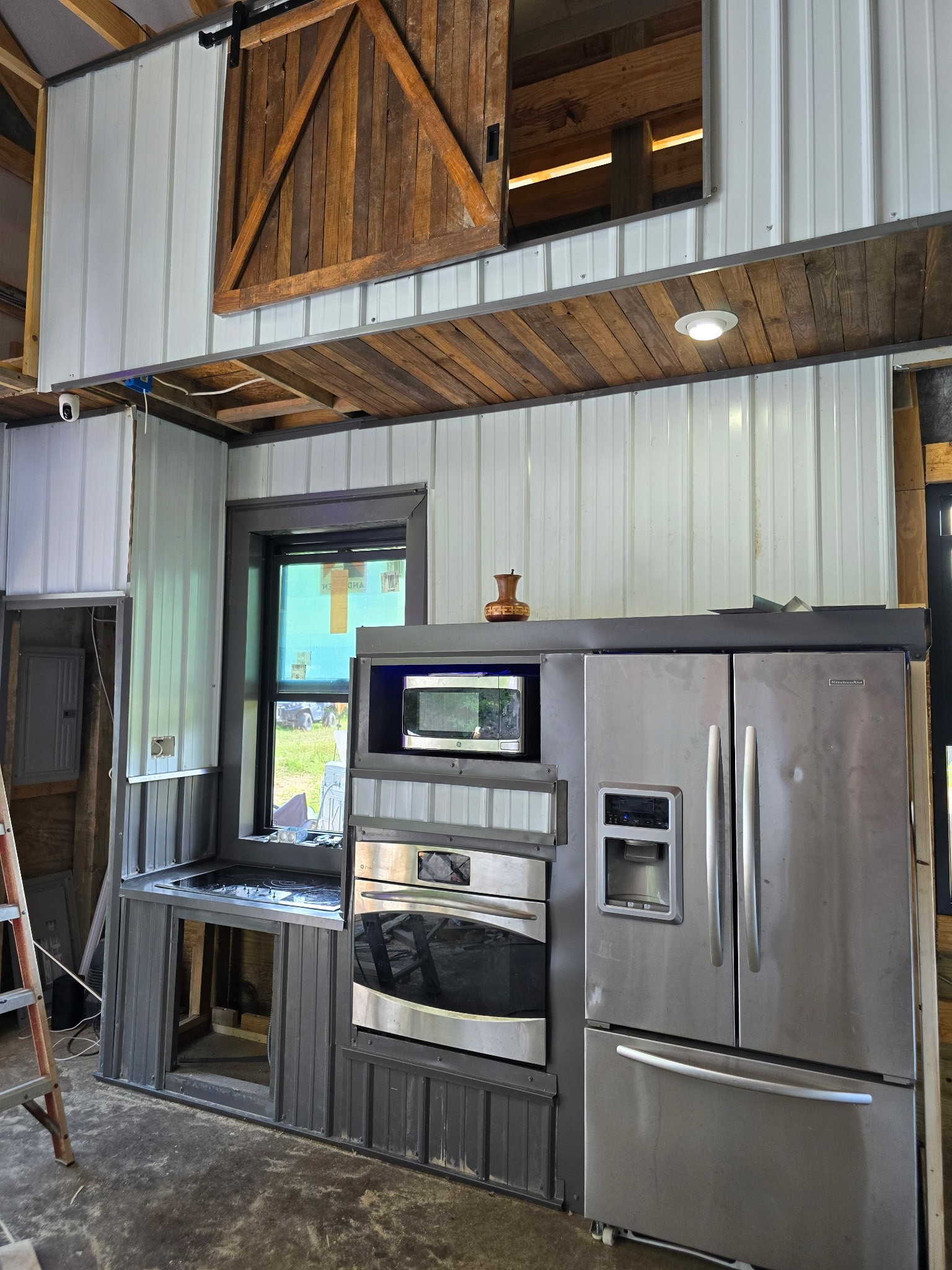 5921 Beard Road Franklin, TN 37064 - Photo 10 of 14 a kitchen with a refrigerator and a sink