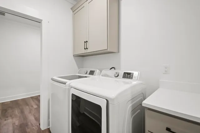 a utility room with dryer and washer