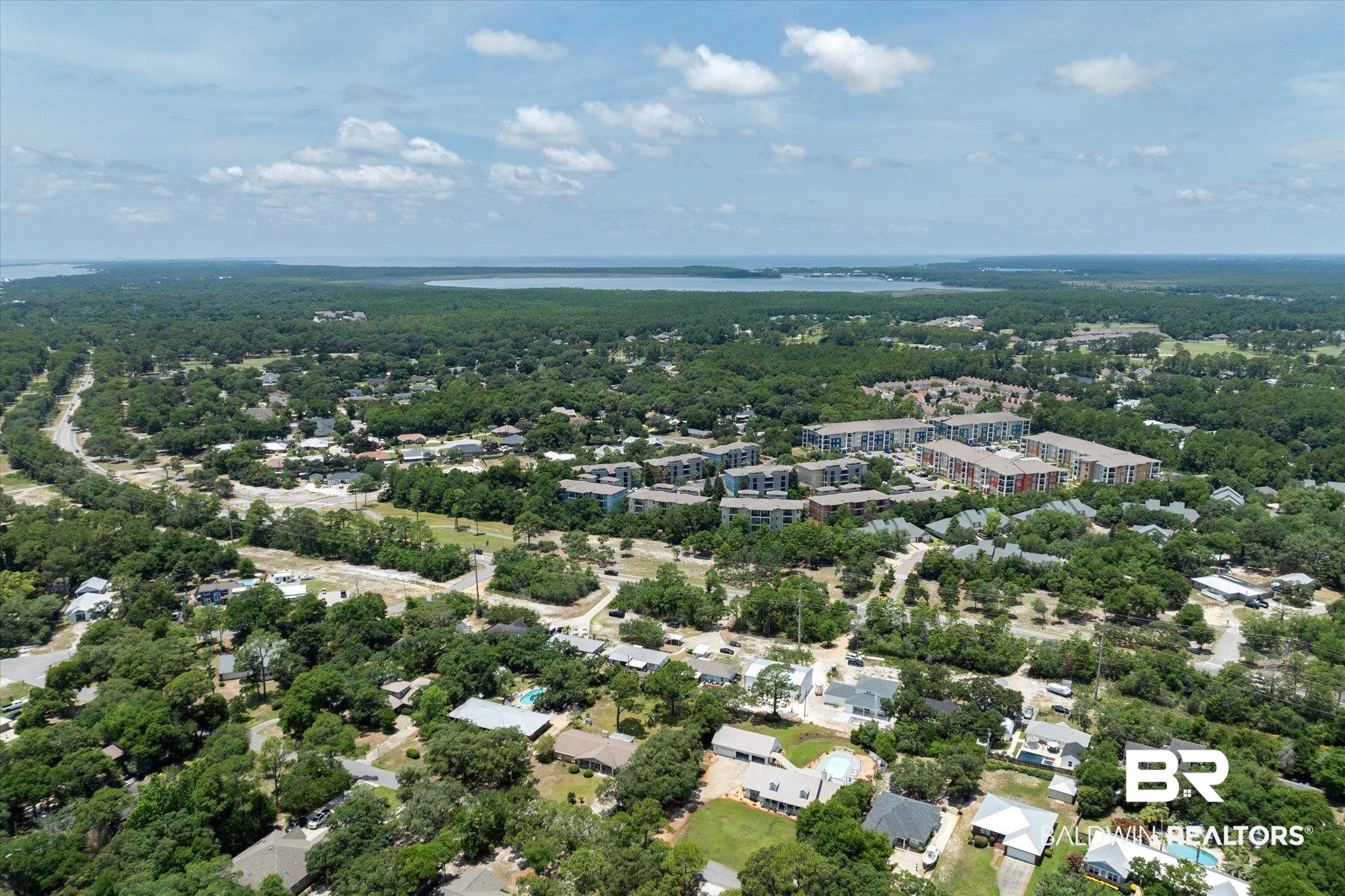 1430 Regency Road, Unit C103 Gulf Shores, AL 36542 - Photo 26 of 29 Drone / aerial view of a heavily wooded area