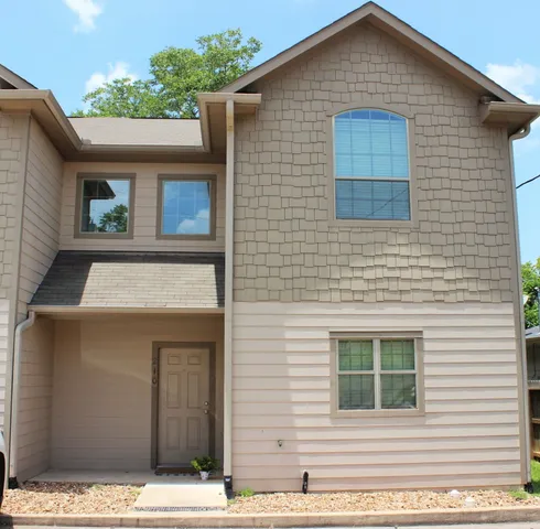 a view of front of house with garage