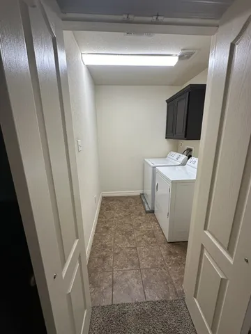 a bathroom with a sink and mirror with toilet