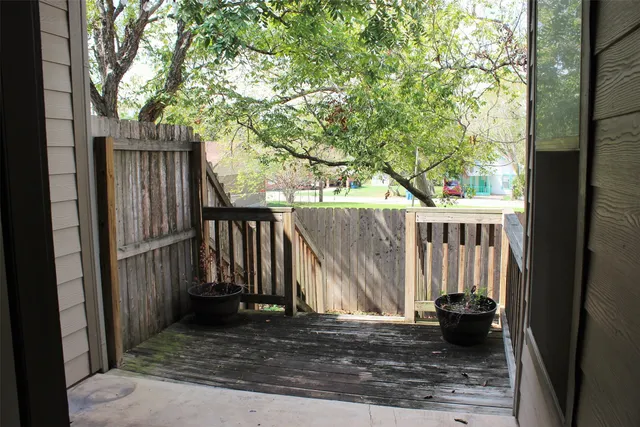 a view of a house with a small yard