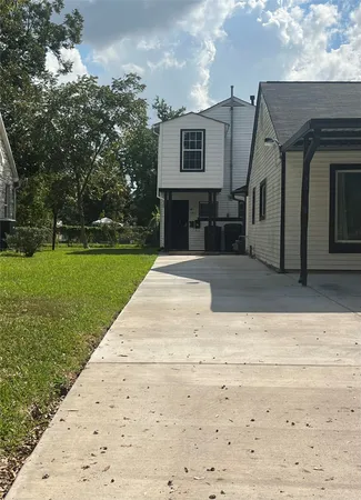 a front view of a house with yard