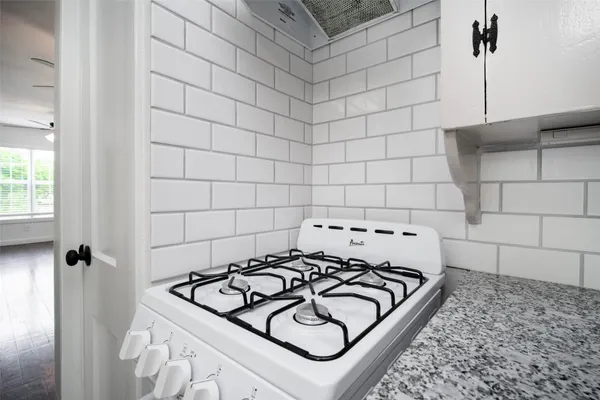 a view of a sink and dishwasher in a bathroom