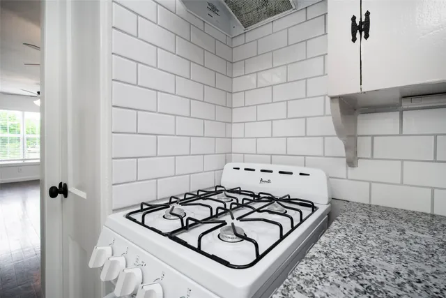 a view of a sink and dishwasher in a bathroom