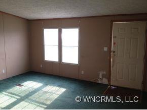 1709 North Canton Road Canton, NC 28716 - Photo 4 of 11 an empty room with window