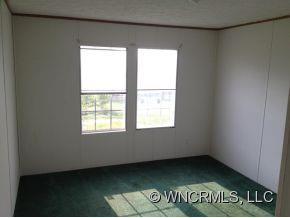 1709 North Canton Road Canton, NC 28716 - Photo 8 of 11 an empty room with a window