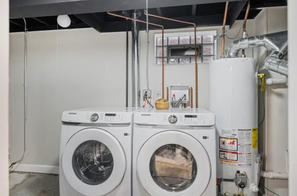 a utility room with dryer and washer