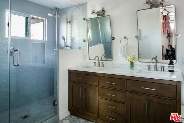 a bedroom with a bed and a chair