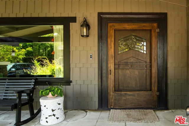 a front view of a house with a porch