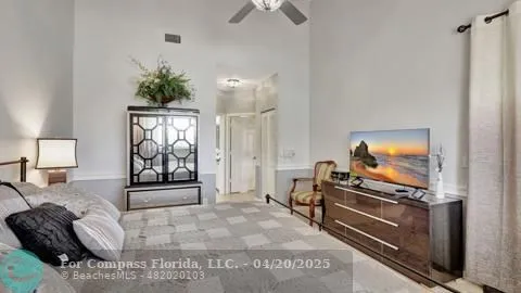 a bathroom with a shower sink and mirror