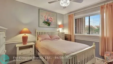 a view of a house with pool and sitting area