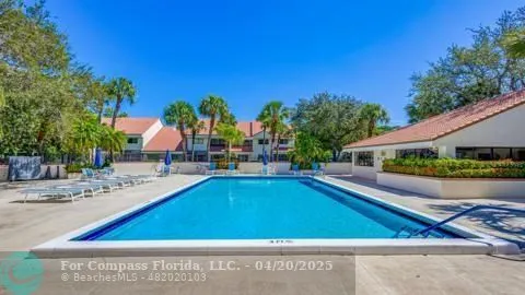 a view of a house with a yard and a garden