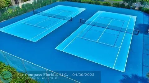 a living room with lots of furniture and white walls