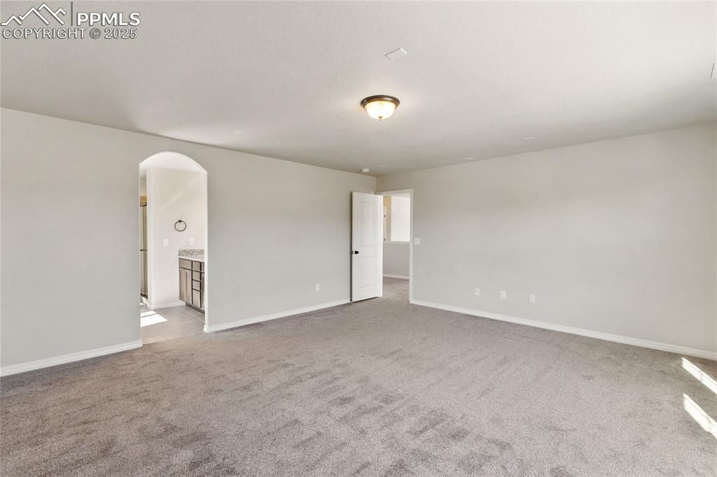 10858 Traders Parkway Fountain, CO 80817 - Photo 22 of 38 an empty room with window