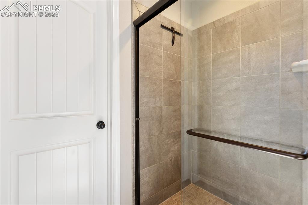 10858 Traders Parkway Fountain, CO 80817 - Photo 26 of 38 a bathroom with a shower